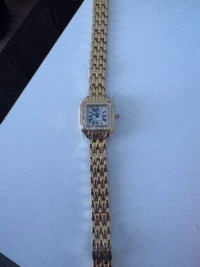 Gold tone watch